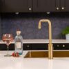 flöde Hjul  | Single Lever Industrial Style Kitchen Tap | Swan Neck Design | Brushed Brass